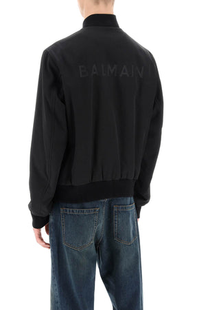 Áo bomber nylon hãng Balmain với in logo nổi bật