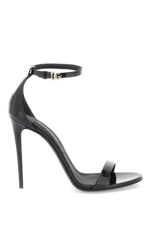 DOLCE & GABBANA Black Patent Leather Sandals with Adjustable Ankle Strap and Golden DG Logo