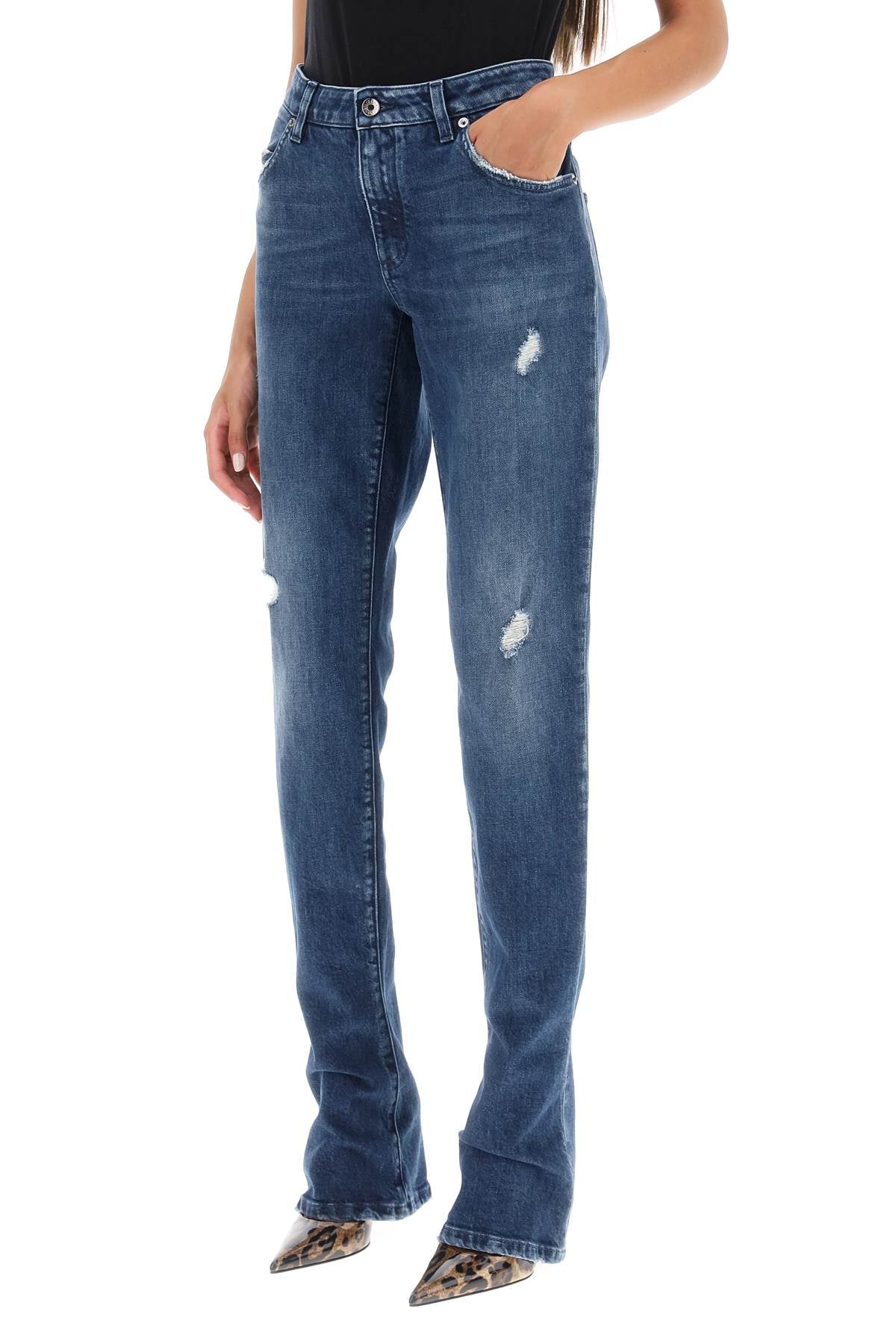 Destroyed Skinny Jeans with Engraved Metal Accents