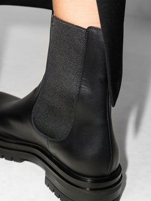 حذاء بوتس تشيلسي من الجلد الأسود للنساء