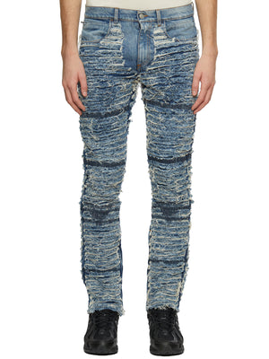 男士蓝色100%棉质长裤，带6个口袋和前部撕裂设计，适合FW23季节