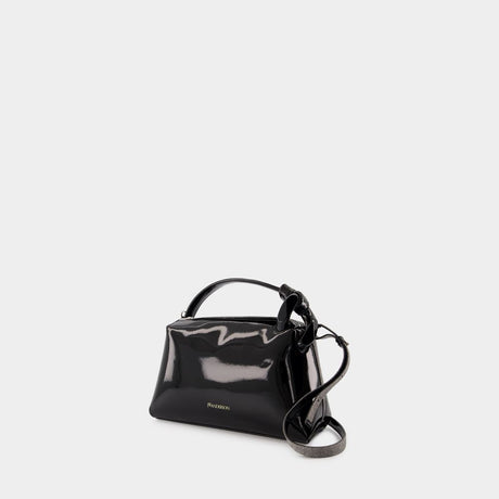 JW ANDERSON The Corner Mini Crossbody in Black Coated Denim