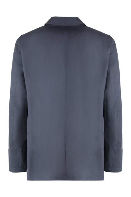 معطف بلون أزرق مع ياقة بتصميم قميص وأحزمة معصم مزخرفة