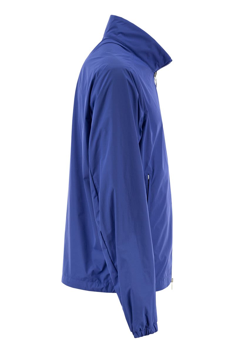 多功能藍色尼龍輕便夾克，男款經典設計