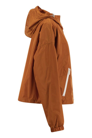 Áo gió ngắn cho nữ màu cam - Vải chống thấm nước, áo khoác cài kéo 2 chiều, túi kéo chéo