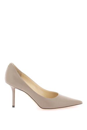 JIMMY CHOO Elegant Beige Leather Pumps with Golden Metal Logo and Leather Sole