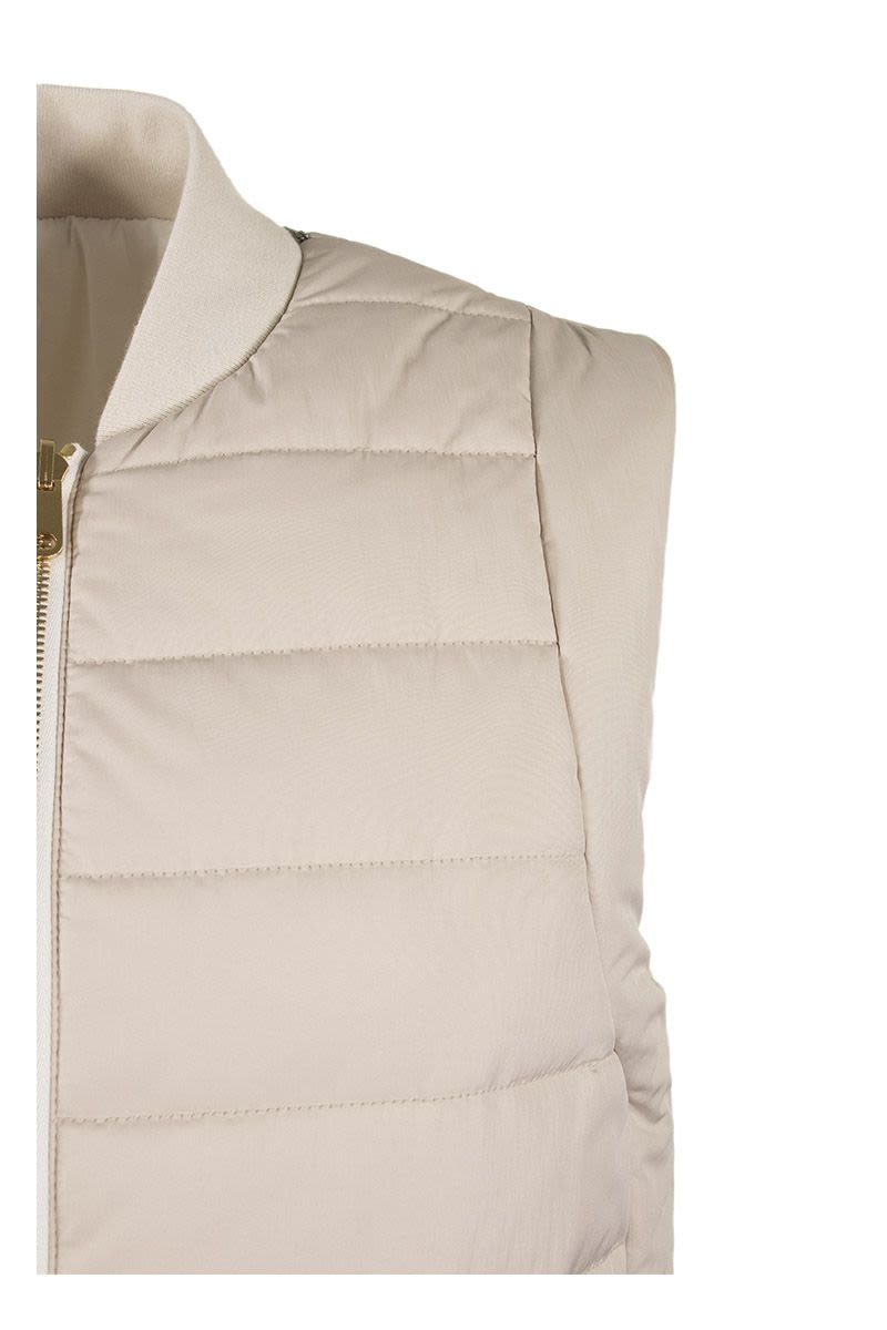 Reversible Water-Resistant Down Vest in the Panama Color - Carryover Collection