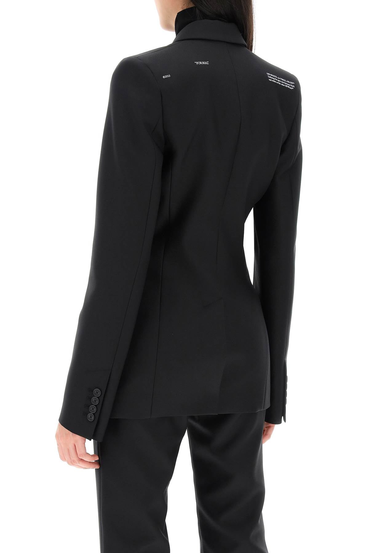 女装黑色企业风西服，尖领单排扣设计