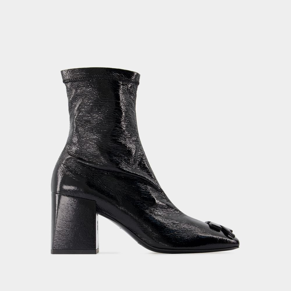 COURREGÈS Sleek Black Vinyl Ankle Boots