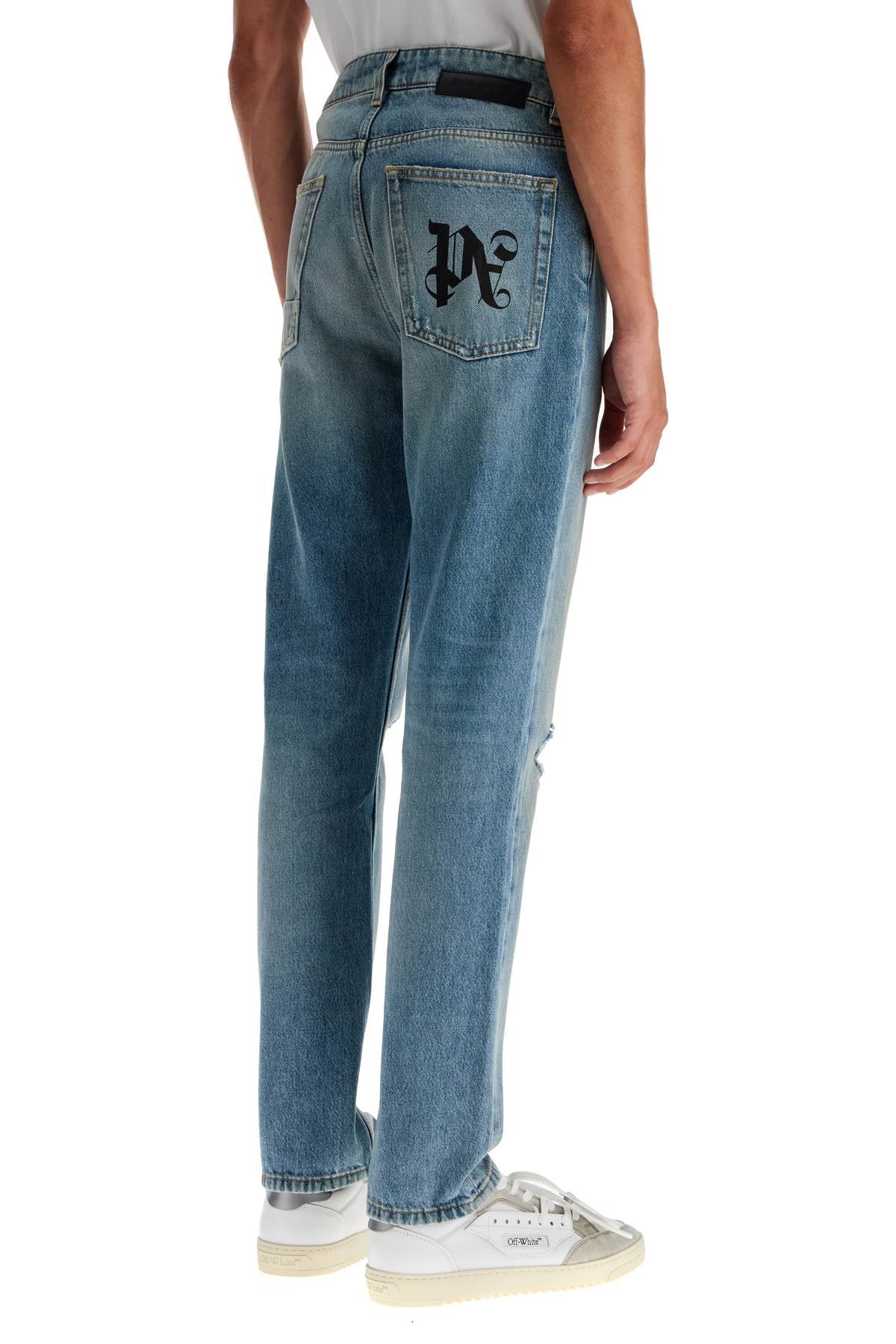 PALM ANGELS Distressed Monogram Denim Jeans