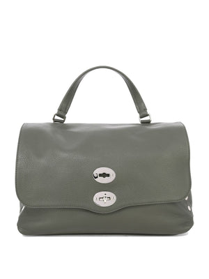 حقيبة يد نسائية جلدية باللون الأخضر - جمال وأناقة في حمل أغراضك اليومية!