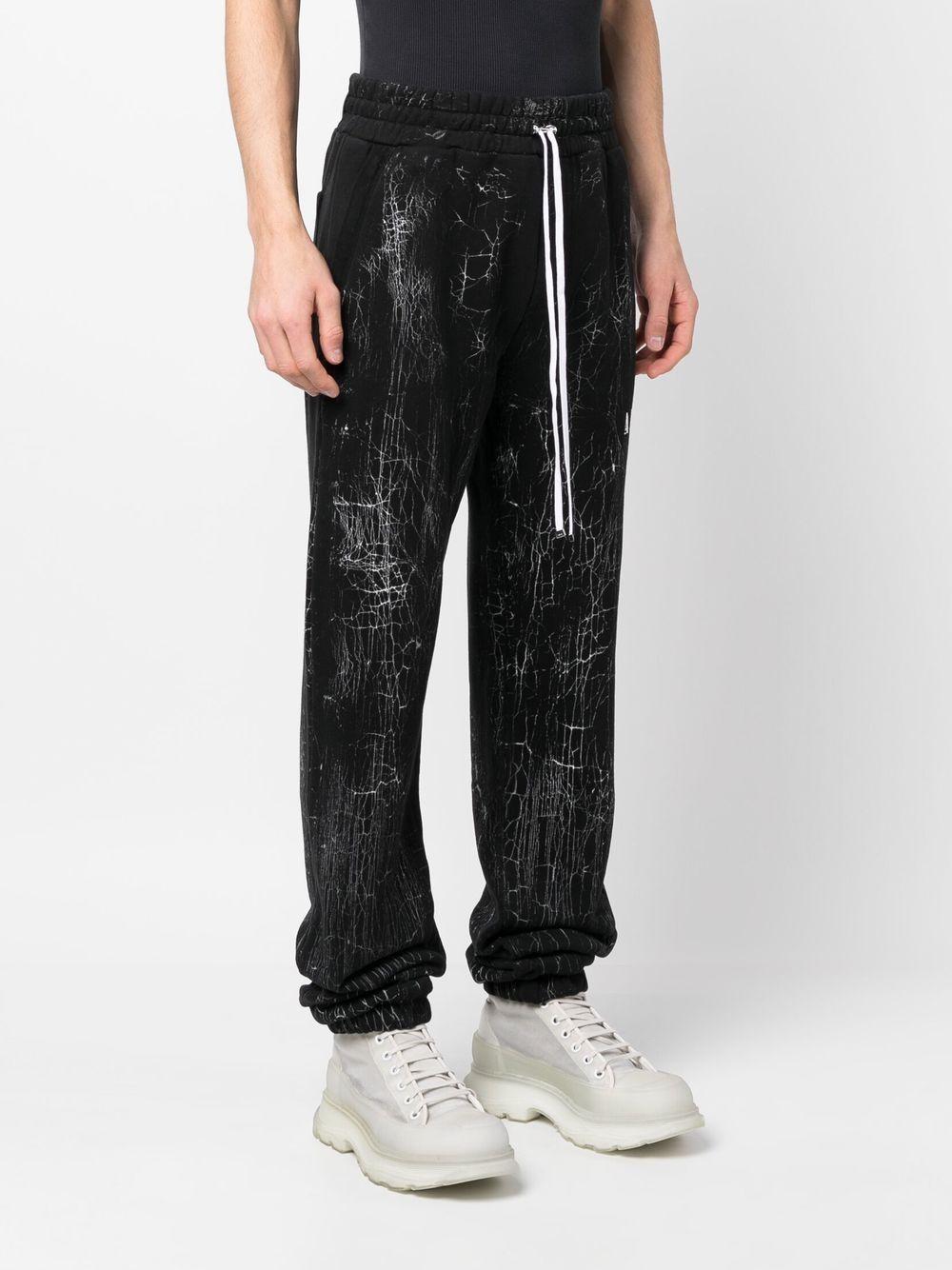 AMIRI Cracked Dye Logo Sweatpants for Men - SS23 Collection