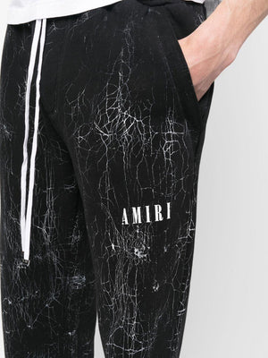 AMIRI Cracked Dye Logo Sweatpants for Men - SS23 Collection