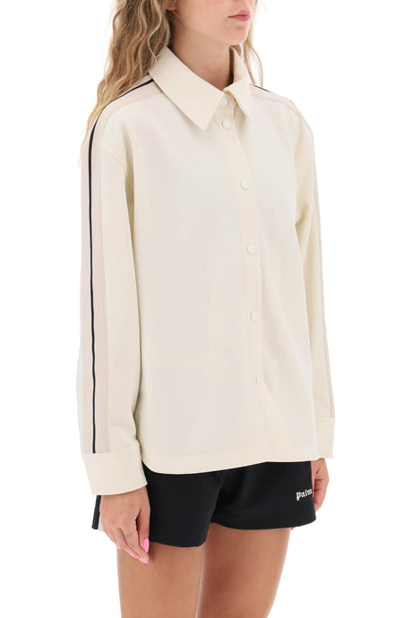 قميص تراك نسائي بشريط جانبي باللون الأبيض