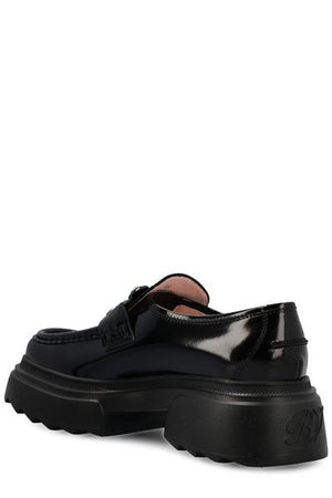 ROGER VIVIER Luxurious Leather Loafers for the Fashion Forward: Black Wallaviv Buckle Moccasins