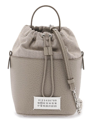 MAISON MARGIELA Mini Bucket Designer Handbag in Hammered Leather with Detachable Strap and White Logo Label - Black