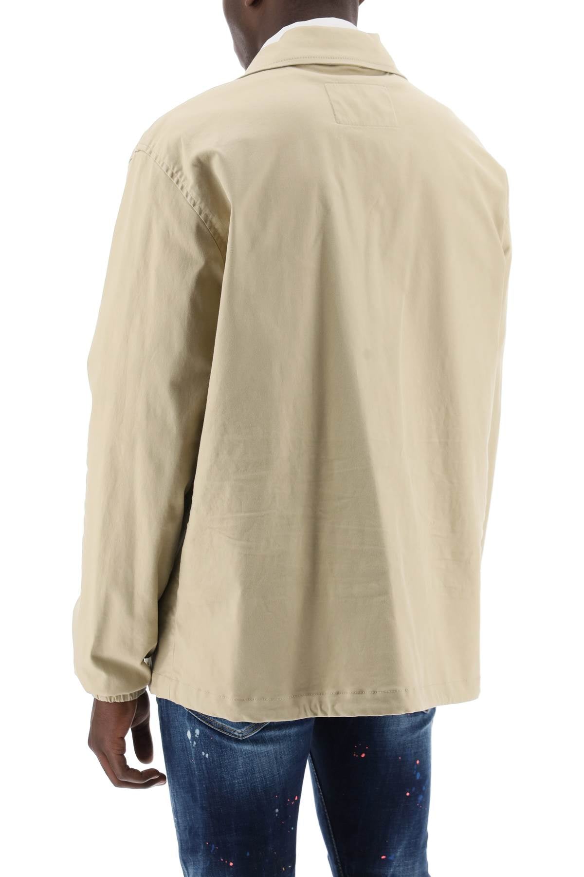 قميص رجالي بلون البيج لفصلي الربيع/الصيف ٢٠٢٤