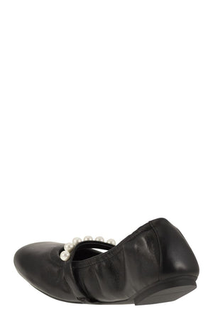 STUART WEITZMAN Classic Black Leather Ballet Flats for Women