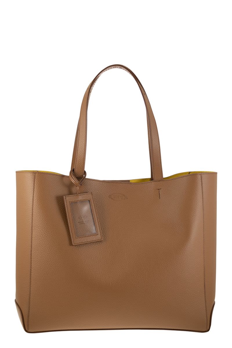 Brown Leather Tote Handbag with Elegant Volumes and Iconic Details