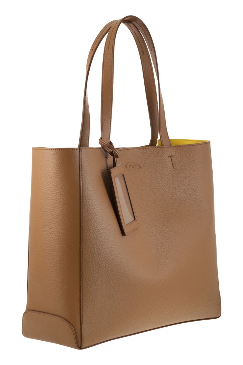 Brown Leather Tote Handbag with Elegant Volumes and Iconic Details