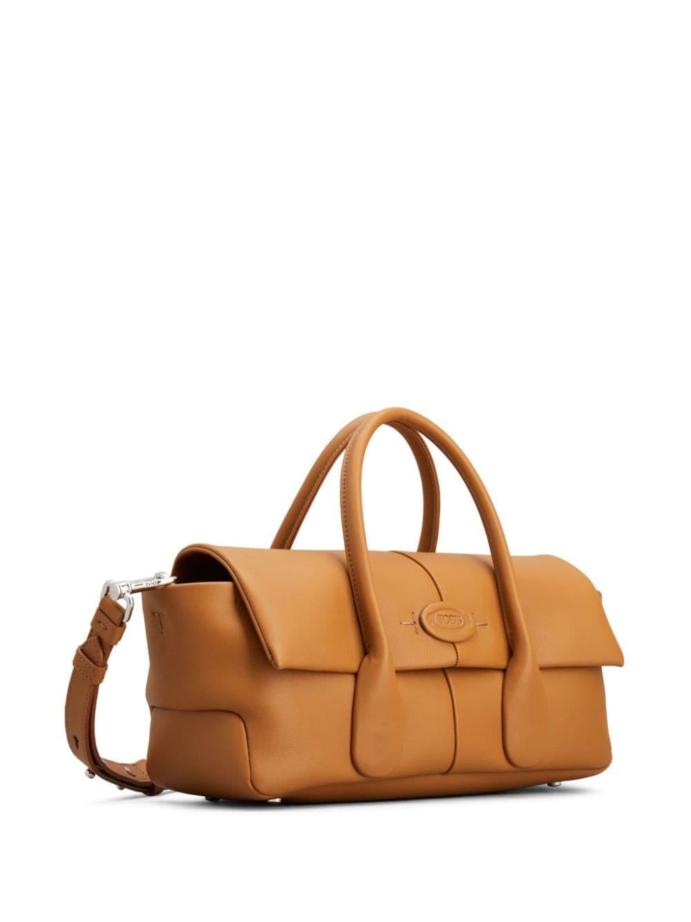 Elegant Brown Leather Handbag with Flap Closure and Adjustable Strap