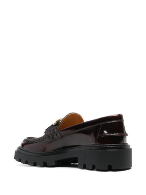 TOD'S Luxurious Black Loafers for the Modern Woman