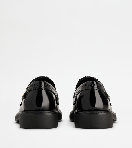 TOD'S Elegant Black Patent Leather Loafers with Brogue Detail