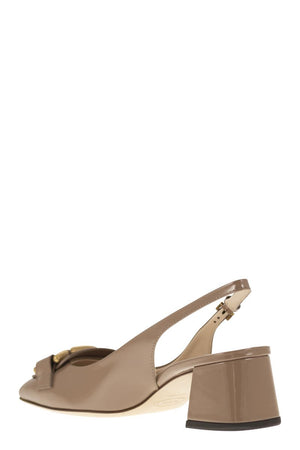 TOD'S Stylish Slingback Pumps with Custom Metal Chain Accessory