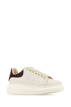 ALEXANDER MCQUEEN Elegant Leather Sneakers with Chic Heel Detail